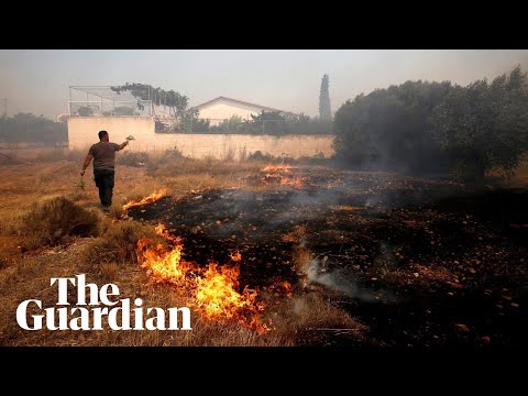 People evacuate homes as wildfire rages south of Greek capital