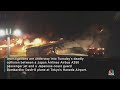 Investigators probe deadly fiery plane collision at Tokyos Haneda Airport  - 01:02 min - News - Video