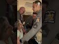 Police remove woman from rowdy GOP town hall
