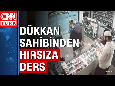 Telefonları çalsa da dükkandan çıkamadı