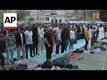 Muslims across Europe celebrate the end of Ramadan performing Eid prayers