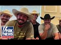 Group of cowboys rescue stranded driver in Hurricane Ian