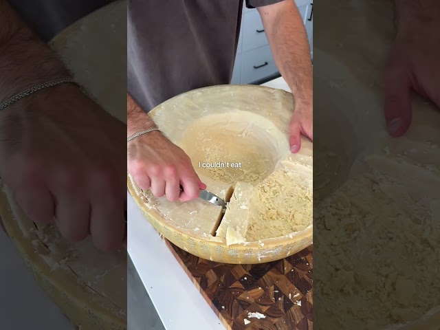 Cutting up the cheese wheel