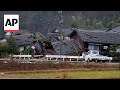 Body recovered from rubble after Japan quakes