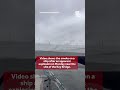 Smoke showing from ship after apparent explosion near Key Bridge