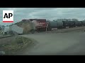 Video captures freight train crashing through grain truck in Minnesota