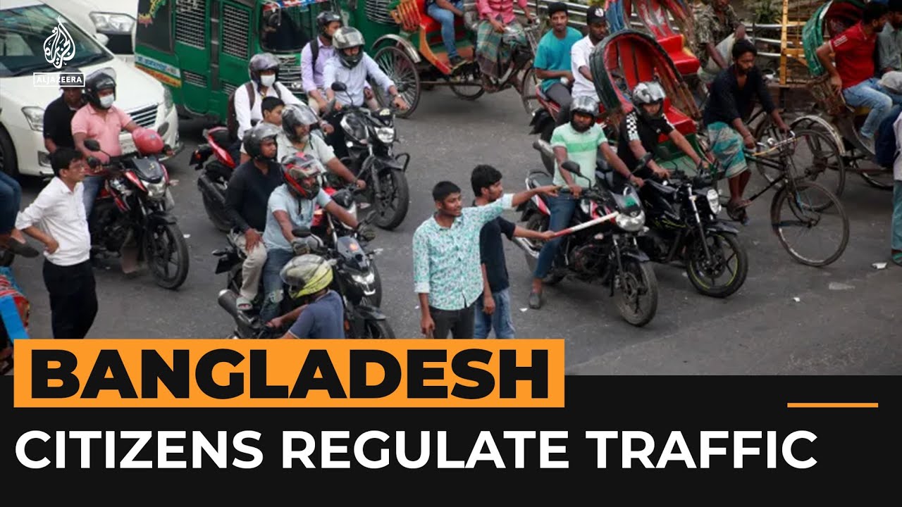 Young Bangladesh citizens direct traffic in Dhaka | AJ #Shorts