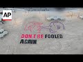 Israeli activists draw portraits of Netanyahu and Trump on beach ahead of meeting