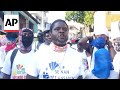 Haitian gang leader marches to national palace in defiance of state of emergency