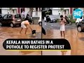 Kerala man bathes in pothole, performs yoga in front of MLA; Bengaluru-style protest In Malappuram