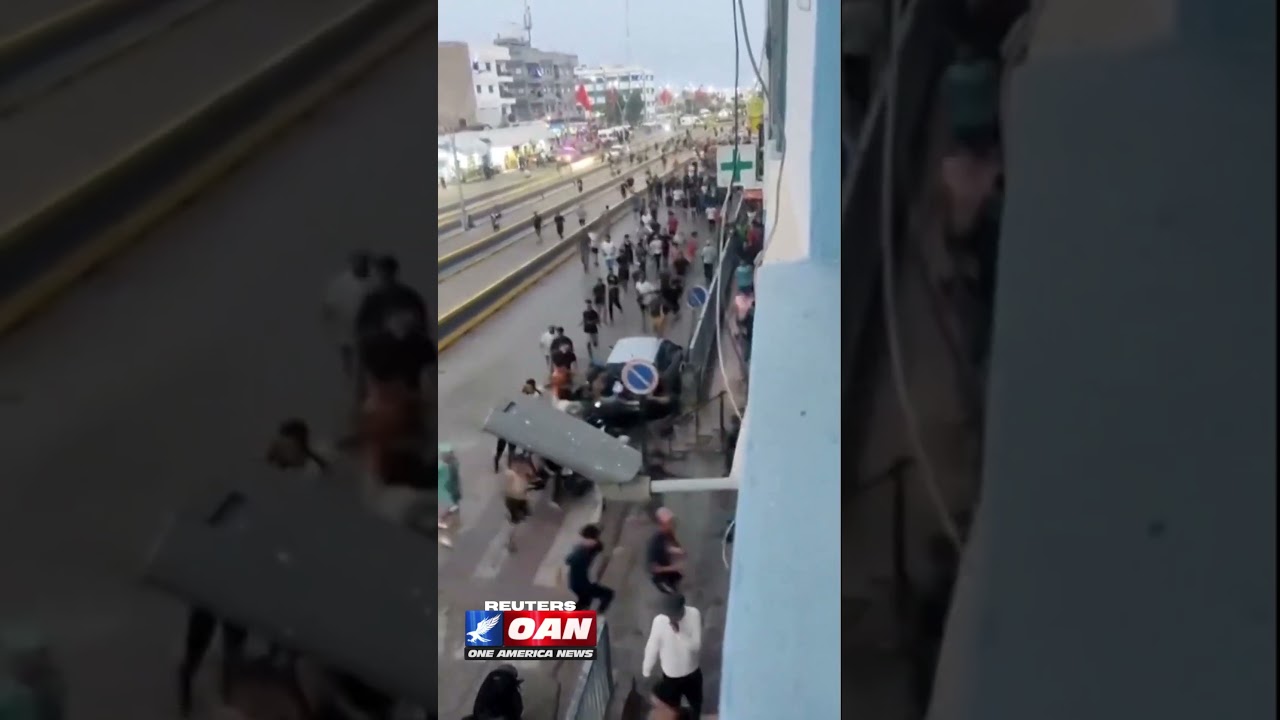 Eyewitness video shows people running through the Beni Ansar border-crossing complex