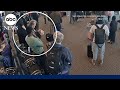 Surveillance footage shows man boarding Delta flight without ticket