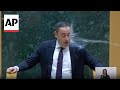 WATCH: Georgian lawmaker doused with water during parliament speech