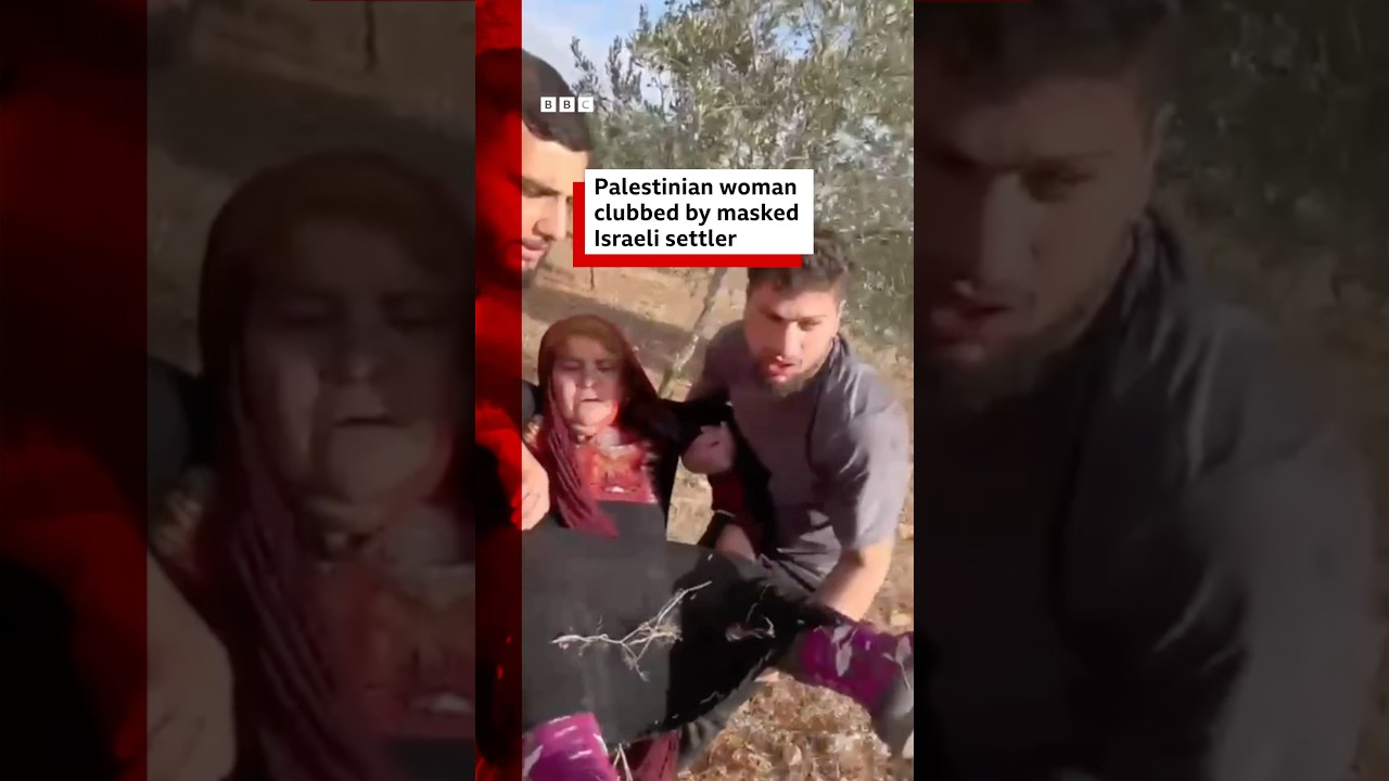 Palestinian woman clubbed by masked Israeli settler. BBCNews