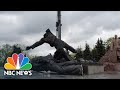Heads Roll As Soviet-Era friendship Monument Dismantled In Kyiv