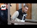 US soldier arrested on theft charges arrives to court in Russias Vladivostok as the trial kicks off