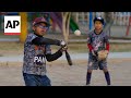 Baseball becomes a shelter for Venezuelan children in soccer crazy Peru