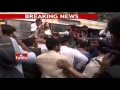 BJP protests against Congress behaviour in Parliament