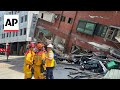 Taiwan firefighters rush to the scene to rescue people trapped after strong earthquake jolts island