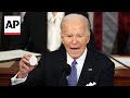Biden holds up Laken Riley pin during State of the Union address