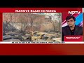 Noida Fire | Over 3 Dozen Scrapped Cars Destroyed In Fire At Abandoned Noida Plot  - 00:30 min - News - Video