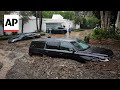 California rain: Cars buried in mudslide, dramatic river rescue caught on camera
