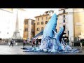 Giant whales breach a 'sea of plastic' in Rome