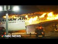 Video shows Japan Airlines passenger plane in flames at Tokyo airport