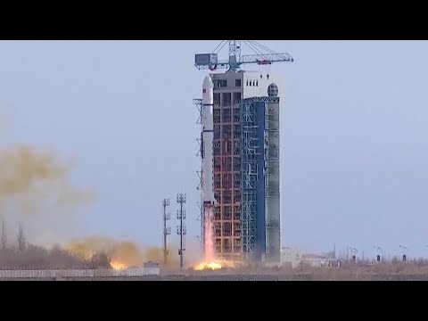 China's Long March 2D launches three satellites, rocket sheds tiles