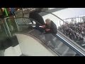 Viral Video : Elderly men struggle to the top of an escalator