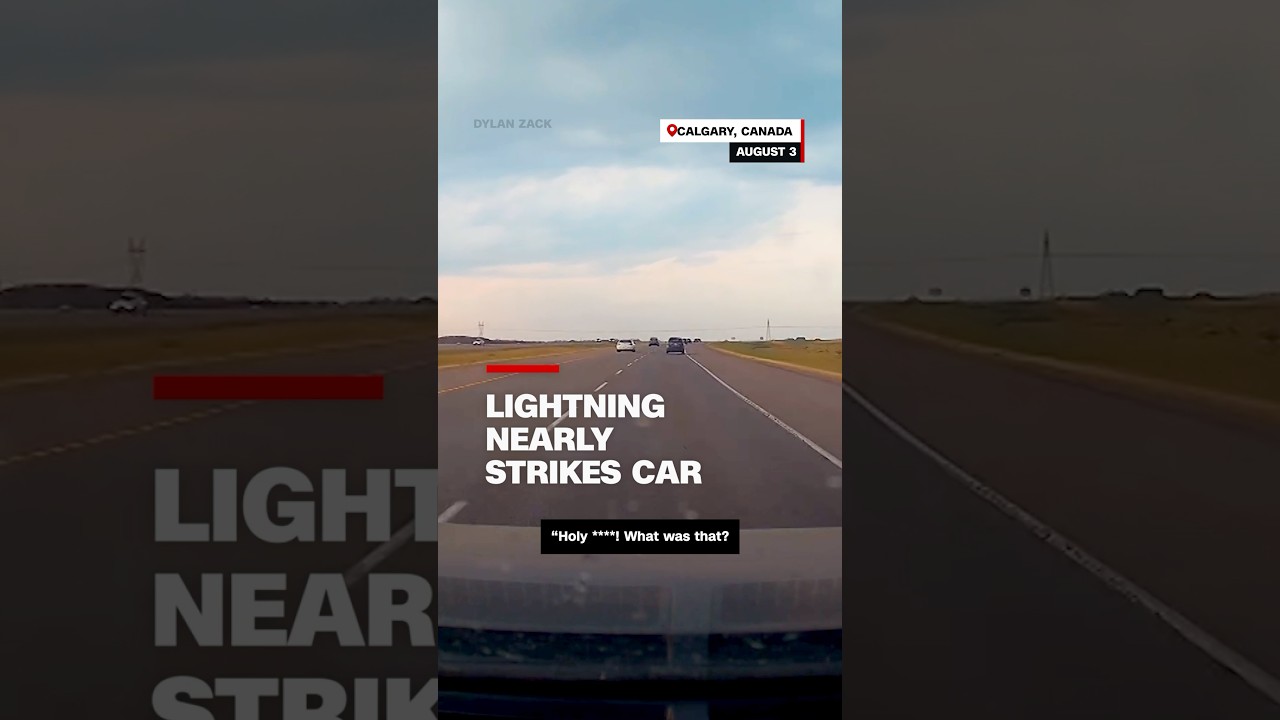 Lightning nearly strikes car