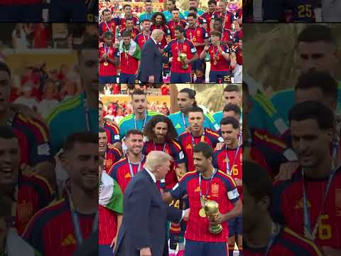 Trump stays on stage as Spain lift World Cup trophy, Infantino tries to coax him away