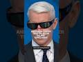 Anderson Cooper tries on solar eclipse sunglasses