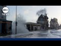 Giant waves crash over seawall, flooding street in western France
