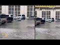 Shocking Footage: Residents Navigate Dubai Floods in Rubber Boat | News9  - 01:26 min - News - Video