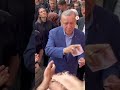 Tayyip Erdogan hands cash to supporters at polling station - 00:45 min - News - Video