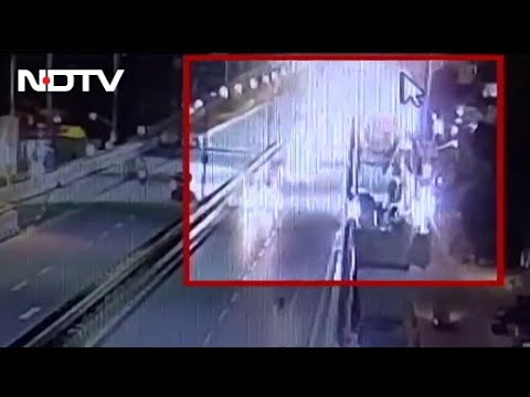 Couple on bike fall to death from flyover after car hits in Bengaluru, CCTV footage Couple on bike fall to death from flyover after car hits in Bengaluru, CCTV footage