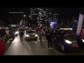 Protesters lock themselves in cages in Tel Aviv, demand release of hostages  - 01:00 min - News - Video