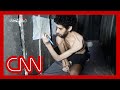 A human skeleton, buried alive: Brother of emaciated Israeli hostage speaks to CNN