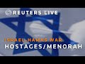 LIVE: Families light menorah candles for hostages held by Hamas