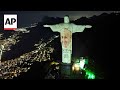Christ the Redeemer illuminated with image of Pope Francis