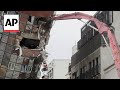 Demolition of a building tilted by Taiwans earthquake starts in Hualien
