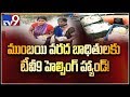 TV9 Marati channel rescues Mumbai flood victims