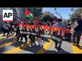 Workers demand higher pay during May Day march in San Francisco