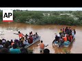 Kenya floods: dozens of people missing after boat capsizes