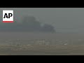 Smoke billows over Gaza as efforts to deliver aid appear to falter