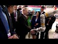 Putin shakes robotic hand at Chinese university | REUTERS  - 00:52 min - News - Video