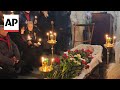 Alexei Navalnys coffin arrives at Moscow cemetery