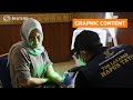WARNING: This video may offend or disturb - Indonesians repent during Ramadan with tattoo removals