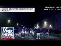 Crowds swarm Virginia police officers in street takeover
